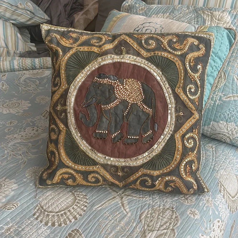 Elephant lovers this pillow is lovely exotic and quite intricate black silk back